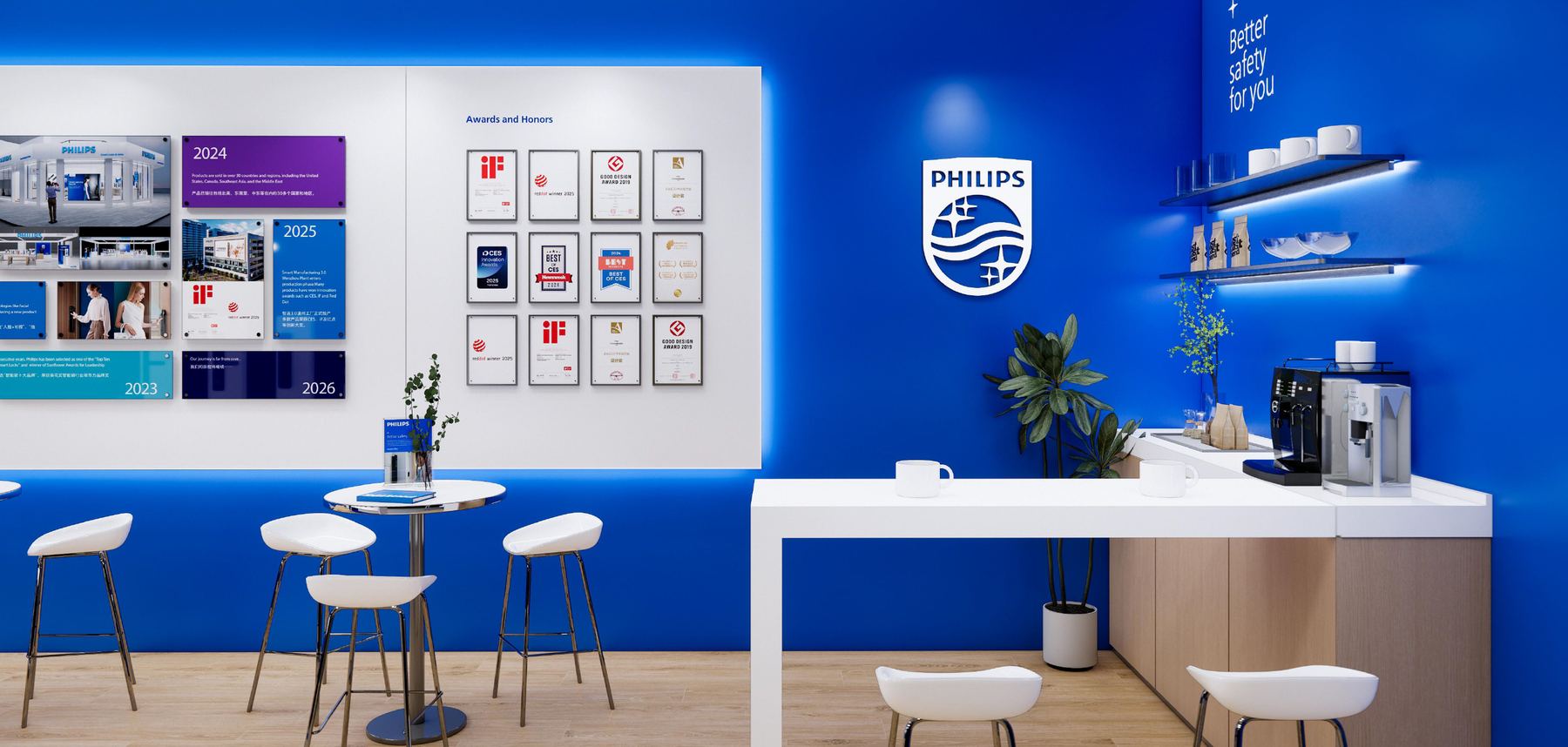 Seating area with the Philips shield, framed award certificates and a coffee station