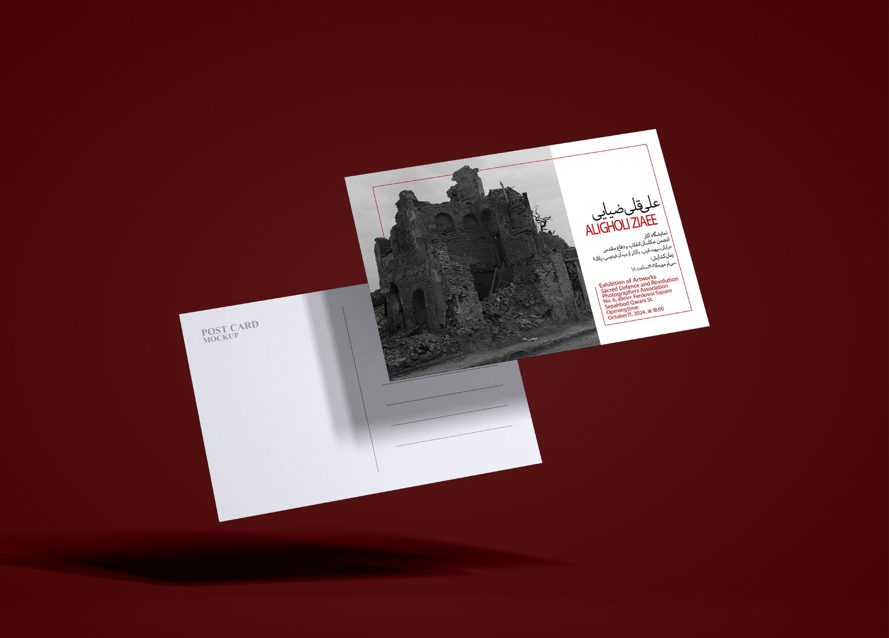 Invitation card and envelope falling against a deep red backdrop